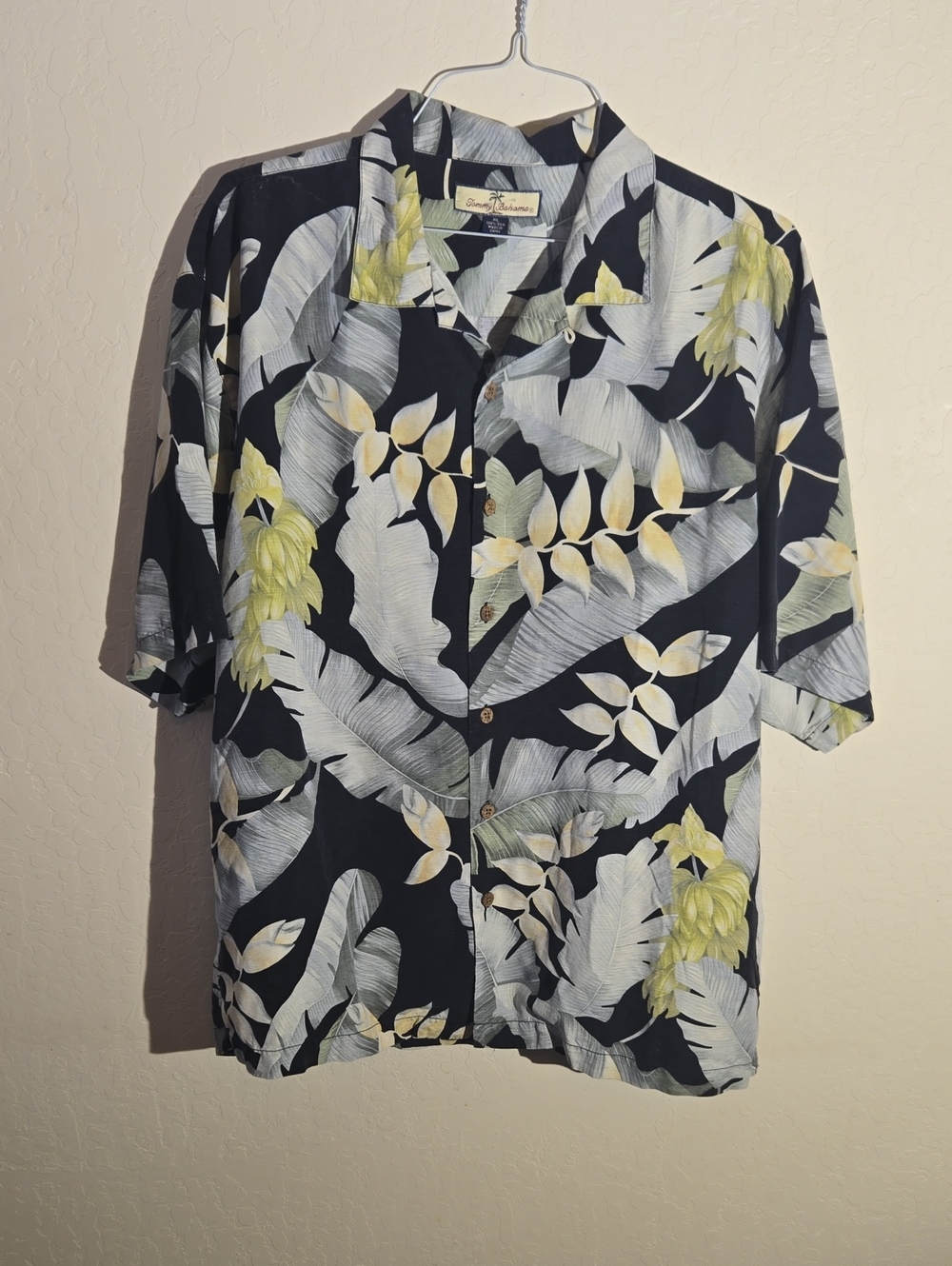 A Tommy Bahama Black Hawaiian Floral Button-Down Shirt